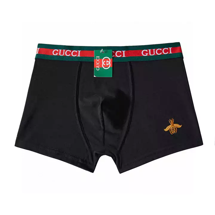 GUCCIボックス3枚組のボクサーパンツは、クラシックなカウンターボックスパンツで、純粋な綿素材で手触りが非常に良いです。ボールを起こさずに変形せず、通気性と吸湿性が非常に優れています。肌に優しく快適で、GUCCIロゴのパターンがフレームに沿ってデザインされています。ゴム入りのウエストバンドは緩みにくく、刺繍された小さなミツバチがあり、永遠のクラシックです。王者の選択肢であり、男性の魅力を完璧に表現し、雄々しさを演出します。