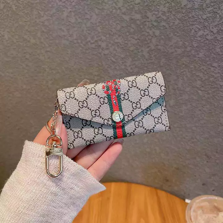 ハイブランド コイン入れ おすすめ グッチ 人造革 友達へのプレゼント 金具 ミニ財布 ボタン式 鍵収納 ビジネス風 ロゴ付き 横開き カード収納 送料無料 小さめ 蜂 小銭入れ GG 流行り