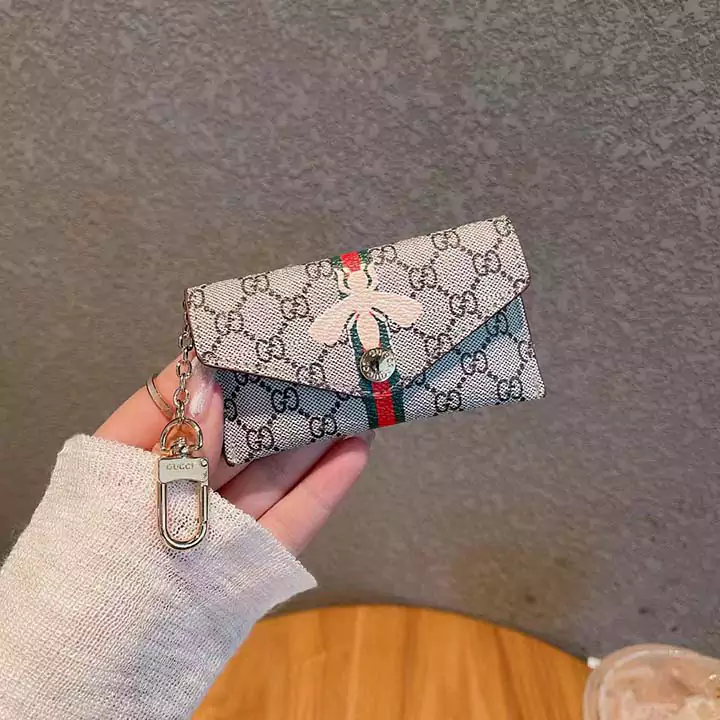 ハイブランド コイン入れ おすすめ グッチ 人造革 友達へのプレゼント 金具 ミニ財布 ボタン式 鍵収納 ビジネス風 ロゴ付き 横開き カード収納 送料無料 小さめ 蜂 小銭入れ GG 流行り