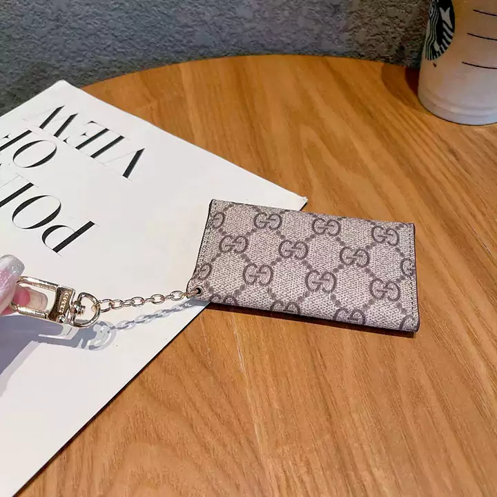 誕生日プレゼント カード収納 ロゴ付き ミニ財布 かわいい 鍵収納 おしゃれ 金具 綺麗 高校生愛用 人造革 コイン入れ ブランド GG アニメ風 ボタン式 小銭入れ gucci 横開き
