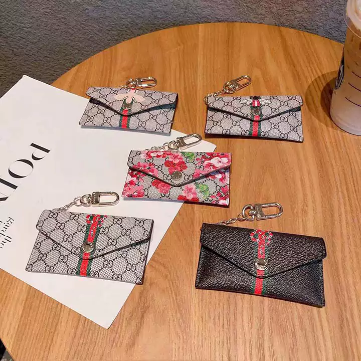 ハイブランド コイン入れ おすすめ グッチ 人造革 友達へのプレゼント 金具 ミニ財布 ボタン式 鍵収納 ビジネス風 ロゴ付き 横開き カード収納 送料無料 小さめ 蜂 小銭入れ GG 流行り