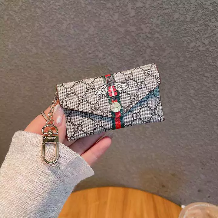 ハイブランド コイン入れ おすすめ グッチ 人造革 友達へのプレゼント 金具 ミニ財布 ボタン式 鍵収納 ビジネス風 ロゴ付き 横開き カード収納 送料無料 小さめ 蜂 小銭入れ GG 流行り